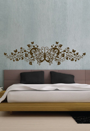 מדבקת קיר - פרפרים ופריחה בראש המיטה