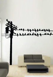 מדבקת קיר - ציפורים יושבות על חוט חשמל לצד עמוד